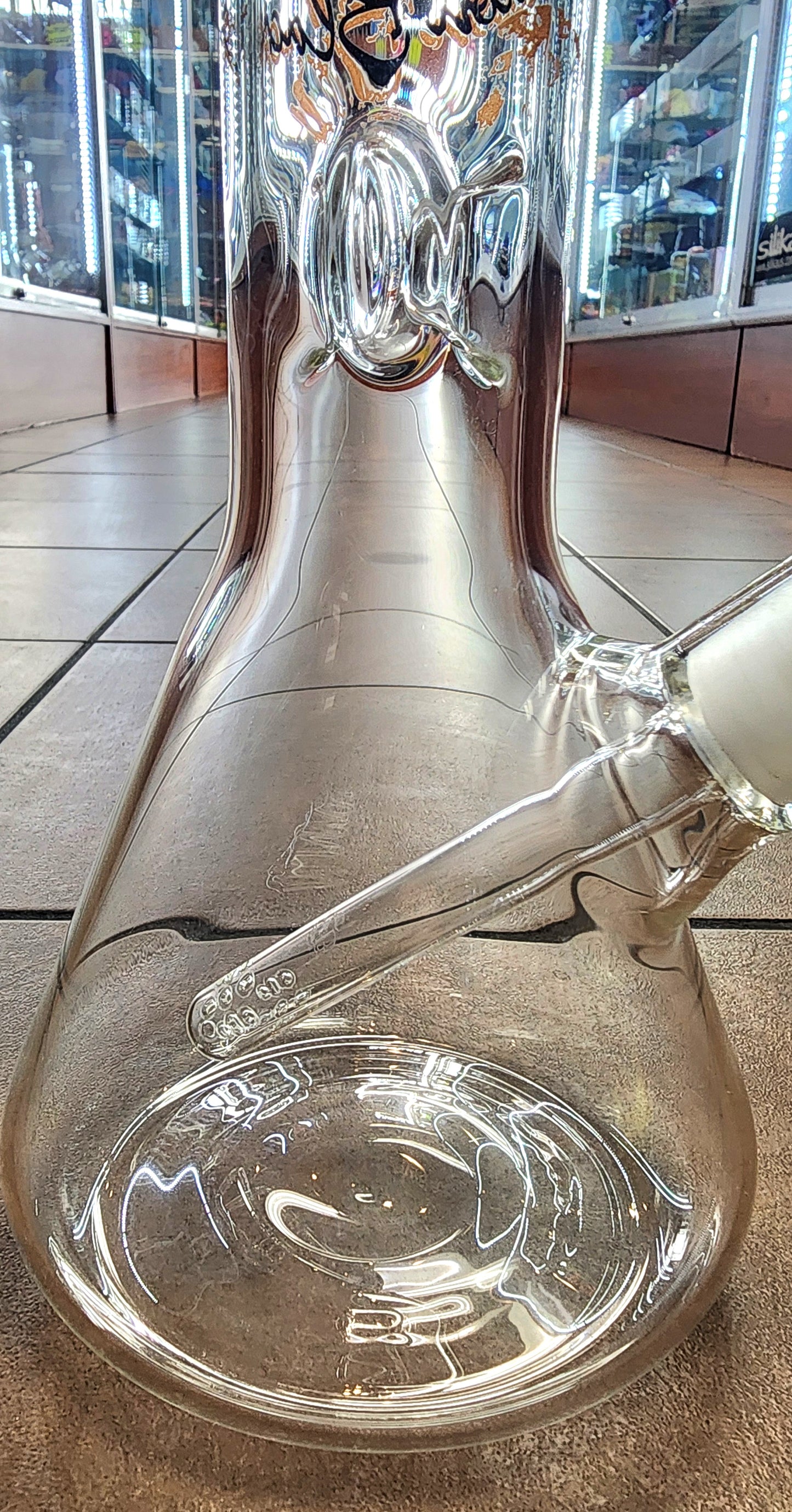Sheldon Black "Man Balancing w/ Gears" Beaker