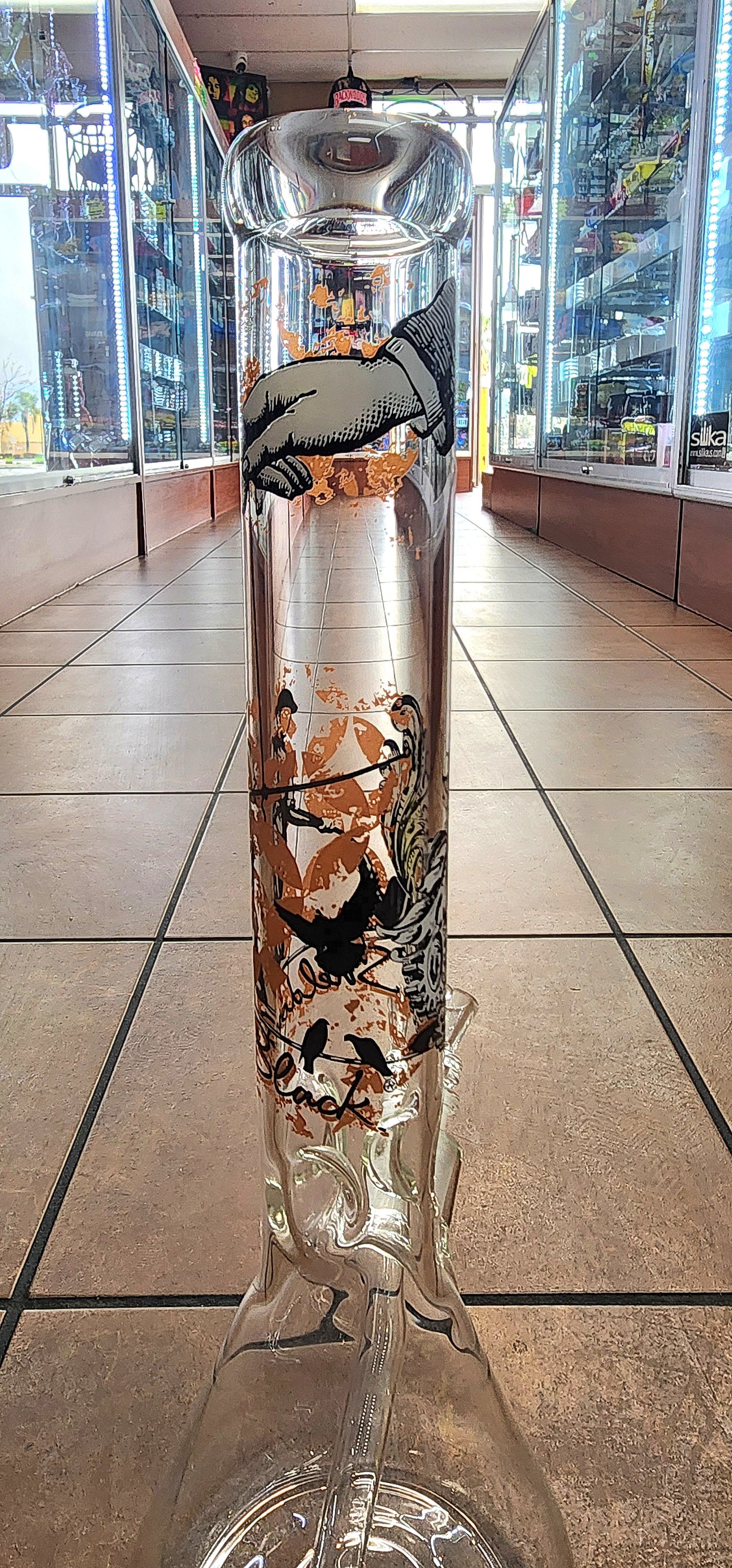 Sheldon Black "Man Balancing w/ Gears" Beaker