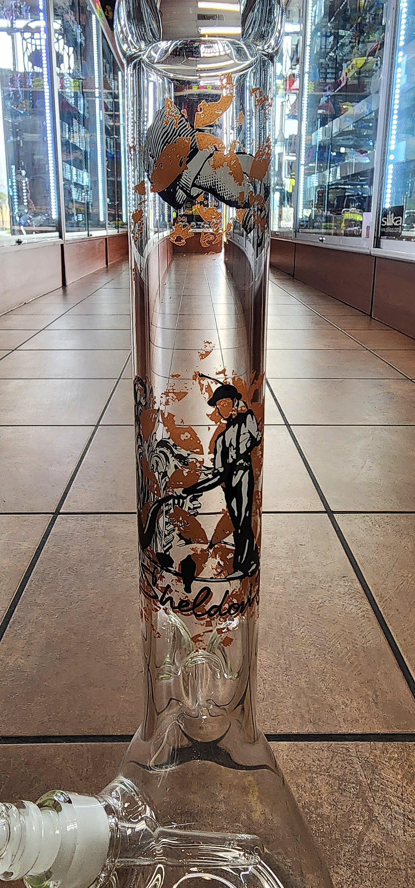 Sheldon Black "Man Balancing w/ Gears" Beaker